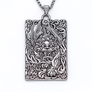 Vintage silver rectangular beast totem pendant necklace with detailed oriental relief carving
