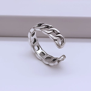Detail shot of vintage silver hollow cuban chain ring with adjustable open structure