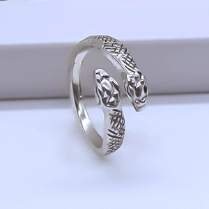 Unique silver double-headed snake open ring with detailed scale texture on white background