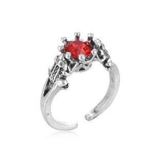 Retro frog crown ring in silver metal with a faceted red ruby stone and open band