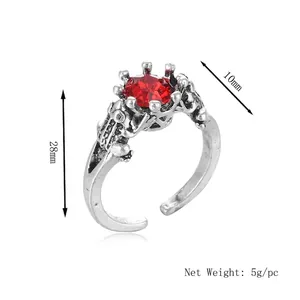 Retro silver crown ring featuring a red ruby gemstone and embossed frog detail