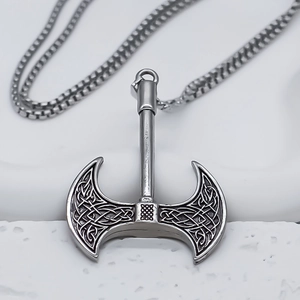 Vintage silver double-edged axe pendant necklace with intricate Celtic knot patterns