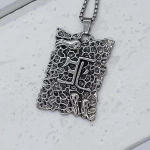 Gothic silver square pendant necklace with ghost carving and textured magma surface