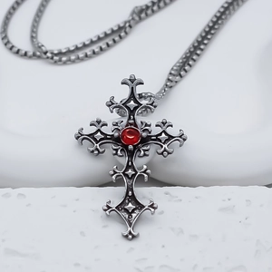 Gothic stainless steel necklace featuring a cross pendant with a red gemstone on box chain