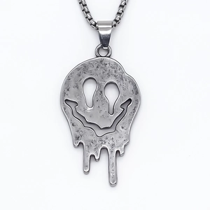 Punk style molten smiley face pendant necklace in silver with distressed metal finish