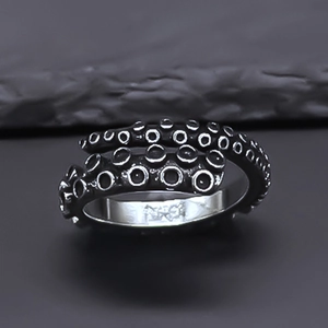 Vintage octopus tentacle ring with detailed suckers and retro oxidized silver finish