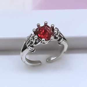 Gothic crown ring with red faceted gemstone and frog sculptures in antique silver finish