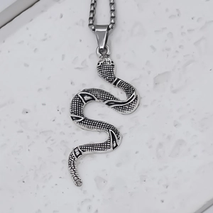 Gothic style snake pendant necklace in vintage silver finish with scale texture
