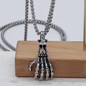 Gothic retro skull and hand bone pendant necklace in vintage silver stainless steel