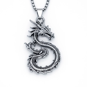Silver dragon totem pendant necklace with intricate scales and vintage box chain links