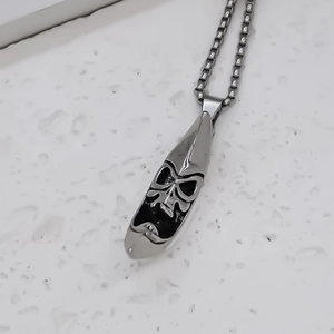 Gothic punk alloy moon mask pendant necklace with long box chain for men on white table