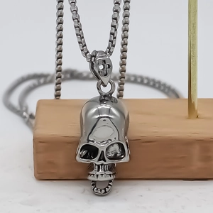 Retro hollow skull pendant necklace with box chain for men and women in vintage style