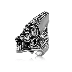 Detailed close-up of retro silver gothic ring featuring devil relief and open band