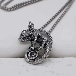 Detailed macro view of the punk style chameleon pendant with vintage scaly texture