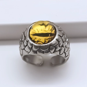 Punk style silver alloy ring featuring a yellow dragon eye and dragon scale texture