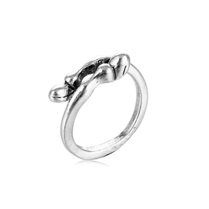 Close-up of vintage silver alloy ring featuring distressed textures and avant-garde design