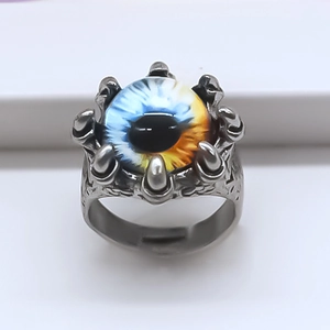 Vintage silver adjustable evil eye ring featuring a blue and yellow gradient glass eye