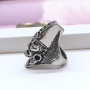 Detailed macro view of vintage warrior helmet relief on an antique silver alloy ring