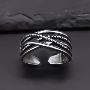 Retro punk style braided alloy ring with irregular design and oxidized finish
