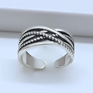 Vintage silver punk ring with multilayered woven texture and adjustable open band design