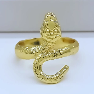 Detailed view of golden snake ring featuring realistic scale textures and alloy finish