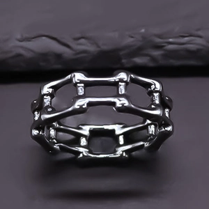 Irregular hollow geometric gun-black ring in industrial punk style for men and women