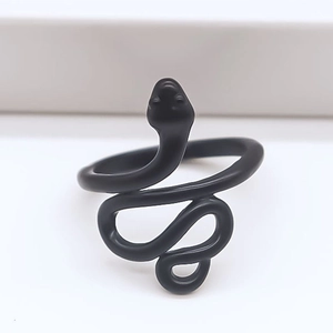 Detailed macro view of punk style matte black snake ring with unique bionic structure