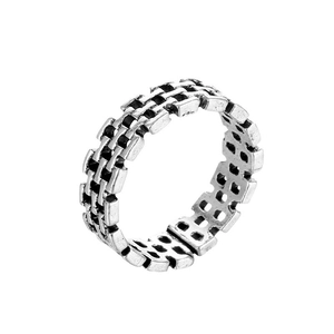 Irregular hollow woven silver alloy ring with vintage oxidized finish and industrial style