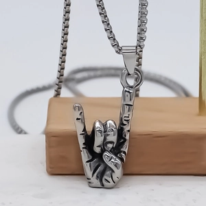 Retro hip-hop hand gesture pendant necklace with vintage texture on a steel box chain