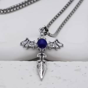 Gothic silver cross pendant necklace with bat wings and blue center stone