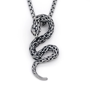 Vintage silver snake pendant necklace with detailed scales on a classic box chain