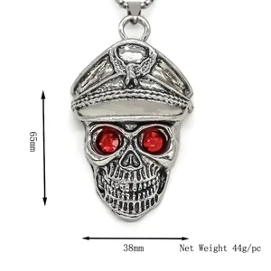 Vintage punk silver skull pendant with red gemstone eyes and military eagle cap