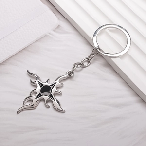 Vintage flame cross keychain with silver metal alloy and gothic black center ornament