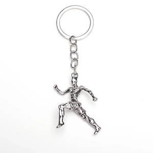 Detailed close-up of a silver alloy keychain featuring a realistic running athlete pendant