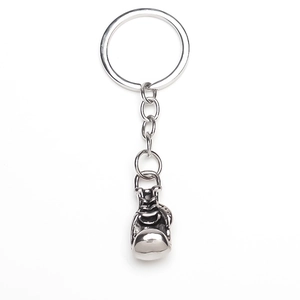 Detailed view of silver boxing glove keychain pendant with circular metal split ring