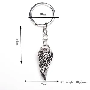 Vintage wing pendant keychain in zinc alloy with detailed size measurements 94mm