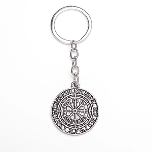 Detailed close-up of a silver Viking Vegvisir keychain with intricate runic engravings