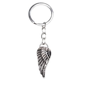 Hip hop style wing keychain in vintage silver finish with detailed feather textures