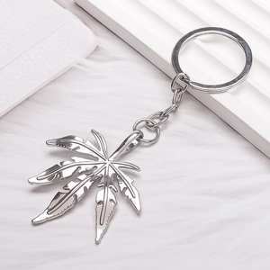 Vintage silver maple leaf keychain with polished alloy pendant and hip-hop style design