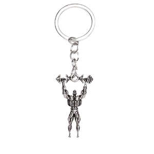 Matte silver fitness keychain featuring a muscular man lifting a barbell barbell pendant