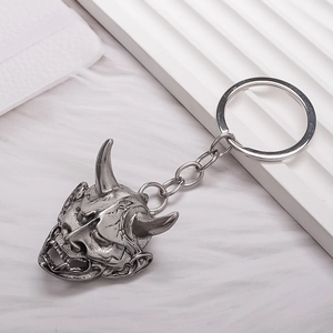 Retro silver Hannya mask keychain with intricate demonic horn details and punk styling