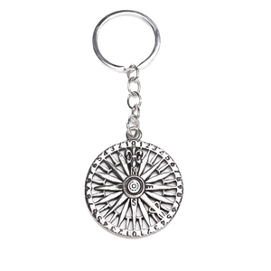 Vintage silver compass keychain with numeric dial and fleur-de-lis metal charm