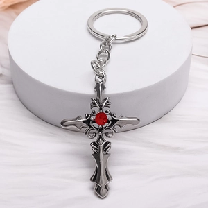Gothic punk alloy cross keychain with red gemstone and vintage hollow floral patterns