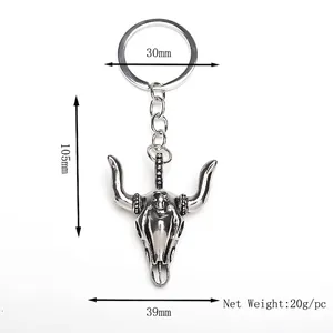 Llavero vintage de calavera de toro en metal plateado, medidas 105x39mm y peso de 20g