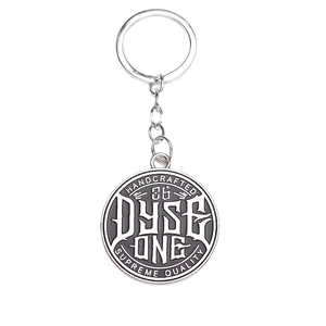 Porte-clés rond Dyse One en métal avec logo en relief et finition en alliage de zinc