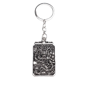 Vintage silver dragon totem metal keychain with embossed rectangular pendant and ring