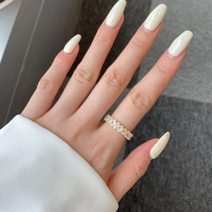 Elegant gold S925 silver ring with full circle oval cubic zirconia stones on model hand