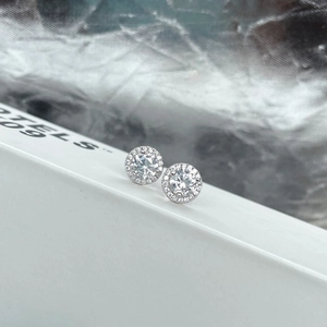 Classic S925 sterling silver halo stud earrings featuring sparkling round cubic zirconia