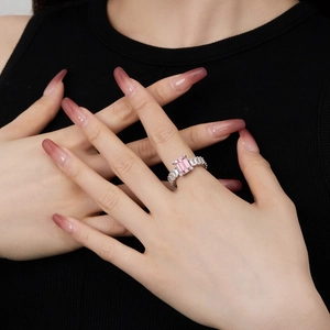 Macro view of S925 sterling silver ring featuring a large emerald-cut pink zircon stone