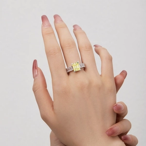 Macro detail of Art Deco S925 silver ring featuring a large emerald cut yellow zircon stone
